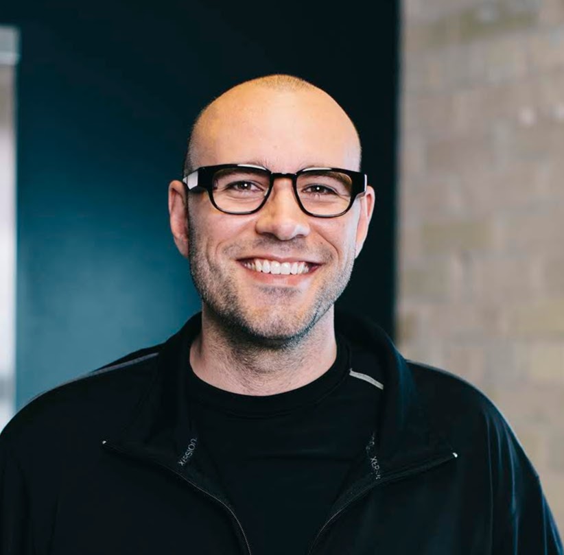 Portrait of Gabriel Reyes wearing smart glasses